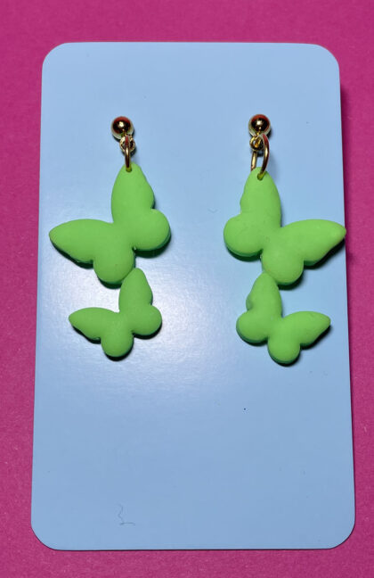Mariposas colgantes verde neon